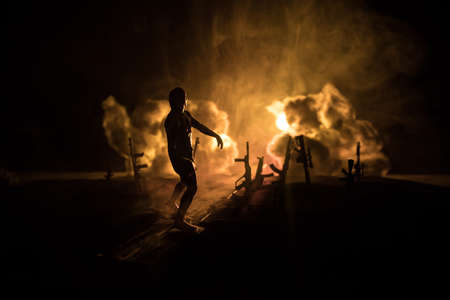 Creative artwork decoration - Russian war in Ukraine concept. Road and giant weapons with giant explosion of nuclear bomb. selective focusの写真素材