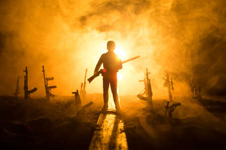 Creative artwork decoration - Russian war in Ukraine concept. Road and giant weapons with giant explosion of nuclear bomb. selective focusの写真素材