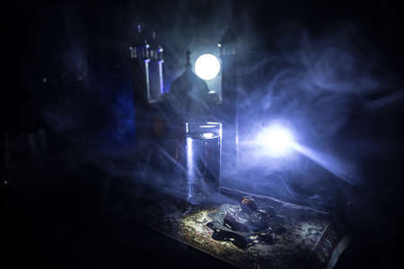 Water and dates. Iftar is the evening meal. View of decoration Ramadan Kareem holiday on sand. Festive greeting card, invitation for Muslim holiday. selective focusの写真素材