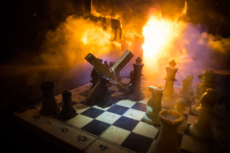 Concept of war or manipulation with global politics. Conceptual image of war using chess board and...