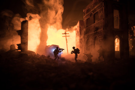 Army sniper with large caliber rifle standing in the fire and smoke. War concept. Battle scene on...