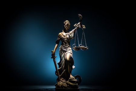 No law or dictatorship concept. The Statue of Justice with anti-riot police helmet holding scale. Creative artwork decoration with colorful toned foggy background. selective focusの写真素材