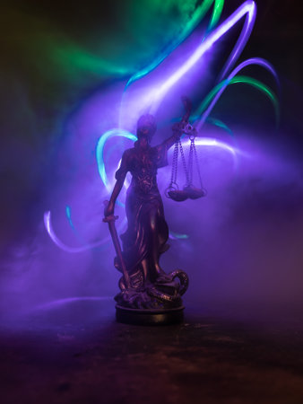 No law or dictatorship concept. The Statue of Justice with anti-riot police helmet holding scale....
