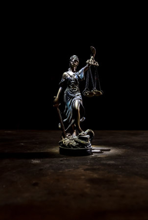 No law or dictatorship concept. The Statue of Justice with anti-riot police helmet holding scale. Creative artwork decoration with colorful toned foggy background. selective focusの写真素材