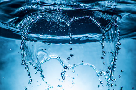 Water splash on dark foggy background. selective focus.の写真素材