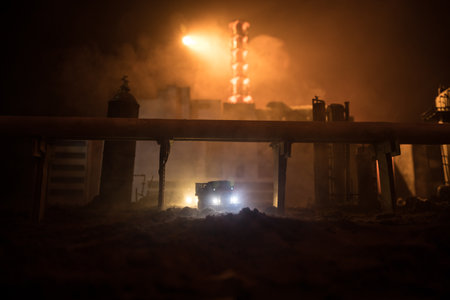 Creative artwork decoration. Chernobyl nuclear power plant at night. Layout of abandoned Chernobyl station after nuclear reactor explosion. Selective focusの写真素材