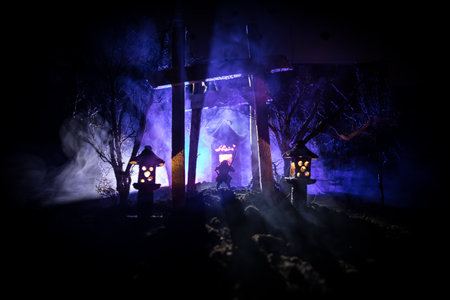 Creative artwork decoration. Abstract Japanese style wooden tunnel at night. Night scene in fantasy forest. Selective focusの写真素材