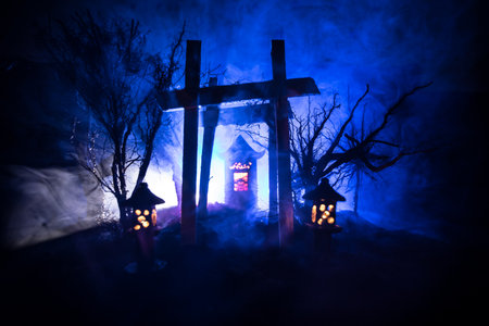 Creative artwork decoration. Abstract Japanese style wooden tunnel at night. Night scene in fantasy forest. Selective focusの写真素材