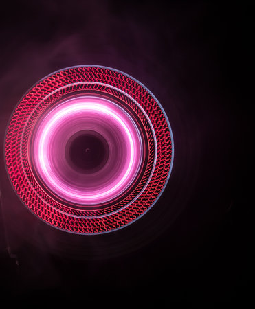 Music DJ concept. Trail of fire and smoke on vinyl record. Burning vinyl disk. Turntable vinyl record player on dark background. selective focusの写真素材