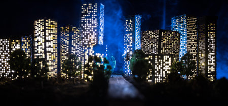 Cartoon style city buildings. Realistic city building miniatures with lights. background. Decorative city. Selective focusの写真素材