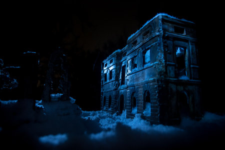 Snow covered ruined city destroyed by war. Creative artwork decoration in dark. selective focusの写真素材