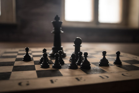 Chess board game concept of business ideas, competition and strategy. Chess figures on a dark background with smoke and fog. Selective focusの写真素材