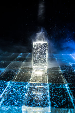 Colorful Glass Bricks Illuminated in Darkness: Vibrant Light Beams and Smoke Effects Creating a Stunning Futuristic Glowの写真素材