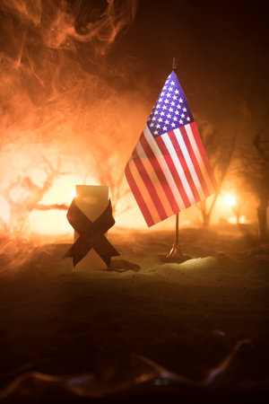 A tabletop diorama of a tragic California wildfire, set in Pacific Palisades near Malibu. Dramatic flames and smoke rise as firefighters battle the blaze.の写真素材