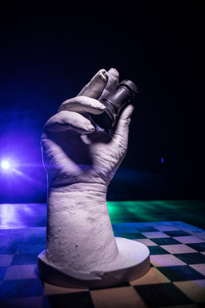 Chess board game concept of business ideas and competition. Chess figures on a dark background....