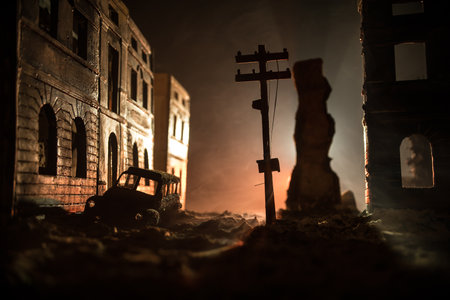 Nuclear war apocalypse concept. Explosion of nuclear bomb in city. City destroyed by atomic war. Creative artwork decoration in dark. Selective focusの写真素材