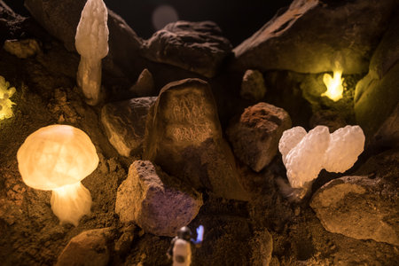 Abstract Miniature of Another Planet with Giant Glowing Mushrooms. A Nighttime Scene on an Alien World, Illuminated by the Soft Glow of Otherworldly Fungi. Selective focusの写真素材