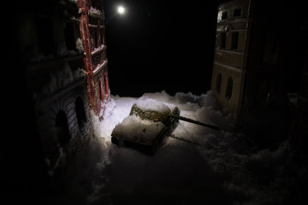 Apocalypse concept. Snow covered ruined city destroyed by war. Creative artwork decoration in dark. selective focusの写真素材