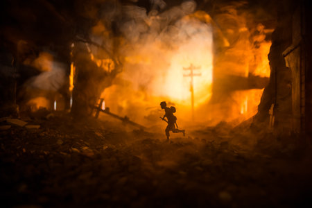 War Concept. Military silhouettes fighting scene on war fog sky background, World War Soldiers Silhouette Below Cloudy Skyline At night. Battle in ruined city. Selective focusの写真素材