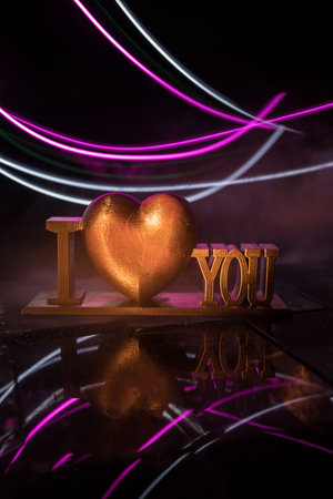 Valentine's Day Concept: A Miniature Table Scene with Items Symbolizing Love, Relationships, and Romance, Including a Heartfelt Love Card, Perfectly Capturing the Spirit of Valentine's Day.の写真素材