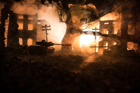 War Concept. Military silhouettes fighting scene on war fog sky background, World War Soldiers Silhouette Below Cloudy Skyline At night. Battle in ruined city. Selective focusの写真素材