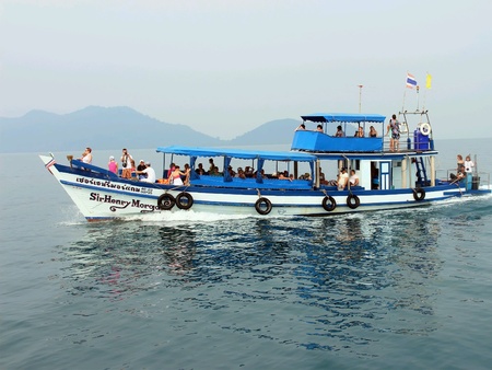 The boat with tourists sail to the island,  Thailand