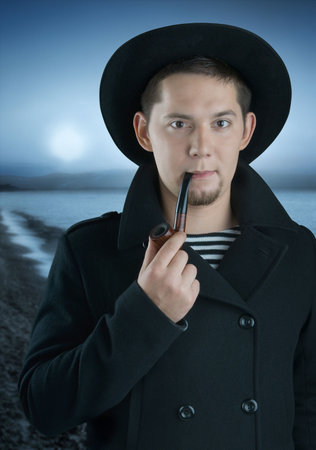 The seaman from the past on background seaの写真素材