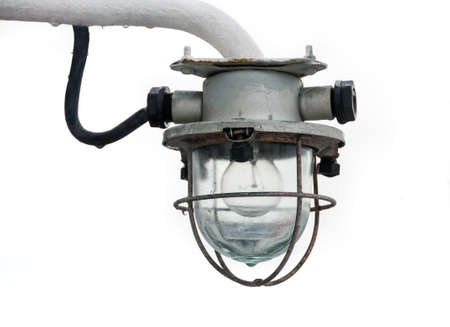 Old lantern on a ship isolated on white background. After the rain, there is a drop.の写真素材