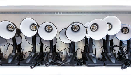 Office desk lamp on a shelf in a store.の写真素材