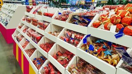 Colored Christmas toys in store. Christmas decorations.の写真素材