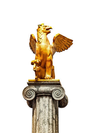 Griffin sculpture on pedestalの写真素材