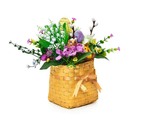 Easter basket from a flower arrangement on white background
