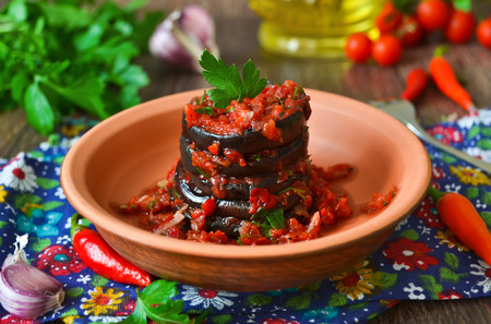 Pickled, spicy eggplant with tomato sauce with pepperの写真素材