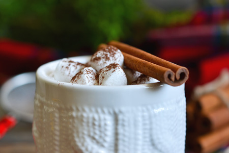 Winter drink - Hot chocolate with marshmallows and cinnamon, rustic. Christmas and a happy new year.の写真素材