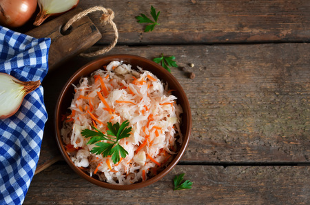 Marinated, sour cabbage with carrots and onionsの写真素材