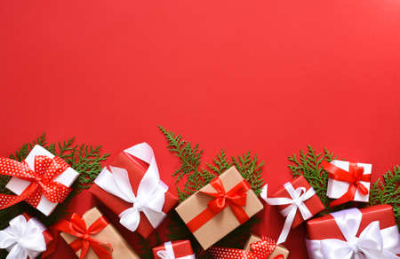Beautiful Christmas decoration with fir and boxes with gifts. Christmas background. Flat.の写真素材