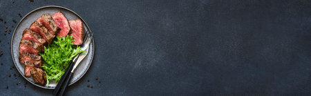 Grilled beef with arugula saladの写真素材