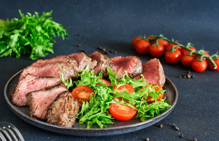 Grilled beef with arugula saladの写真素材