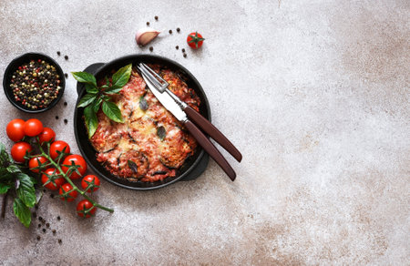 Casserole with eggplant, tomato sauce and cheese, top view, with space for text. Moussaka.の写真素材