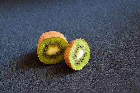 kiwi fruit on black backgroundの写真素材