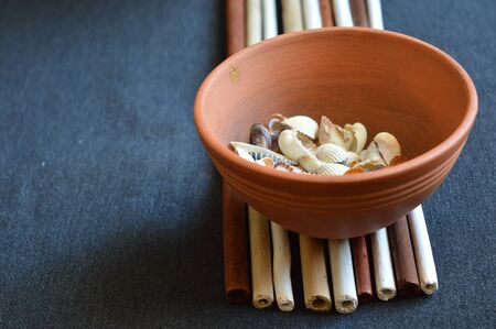 color sticks on a black tableの写真素材