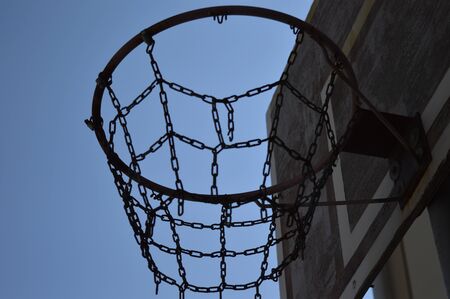 basketball hoop against blue skyの写真素材
