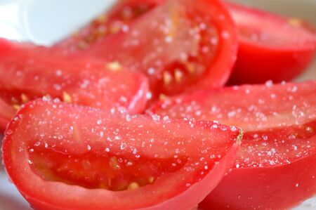 chopped tomatoes and saltの写真素材
