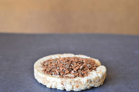 flax seeds on the white breadの写真素材