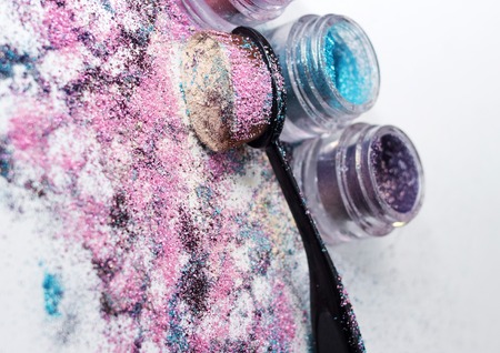 Color pigments for a bright make-up, a brush for make-up.