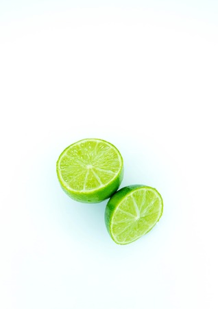 Pieces of ripe juicy lime in a sectionの写真素材