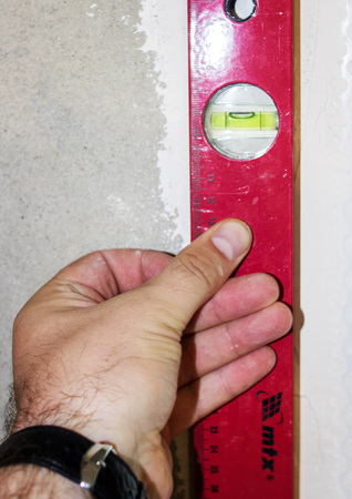 A professional tool for measuring the level of the wall
