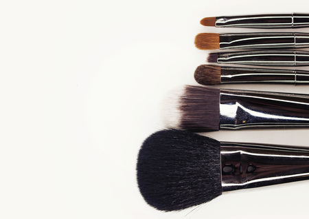 Brushes for professional make-up with fashionable silver handles.