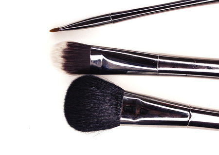 Brushes for professional make-up with fashionable silver handles.
