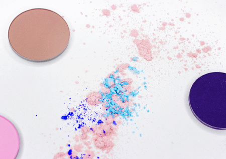 Beautiful makeup shadows scattered on white. Dry textures for professional make-up.の写真素材